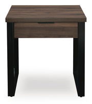 Rectangular Wickman Falls cocktail table by Signature Design Ashley, featuring a sleek wooden surface and sturdy metal legs.