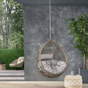 Noble House Morris Teardrop hanging chair with chain and water-resistant cushions, designed for outdoor relaxation and comfort.