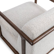 Classic Home Lucia swivel chair with upholstered fabric seat and back, featuring a modern design and a sturdy swivel base.