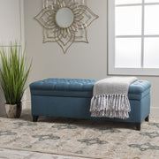 Noble House Juliana storage ottoman with beige fabric top and birch wood legs, serving as a stylish and functional home accent piece.