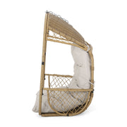 Noble House Malia wicker hanging chair with cushion, outdoor hammock seat with sturdy frame and plush cushion for relaxing.