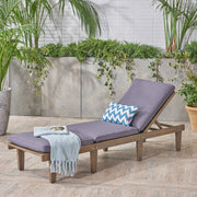 Noble House Ariana wood chaise lounge with cushion, featuring a sleek design and comfortable seating for relaxing indoors or outdoors.