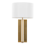 Lumi Source Cosmo contemporary table lamp with a sleek, modern design and a cylindrical shade on a sturdy base.