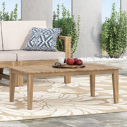 Light brown outdoor coffee table with slat panel top by Noble House, showcasing a sturdy wooden design for patio or garden use.