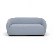 TOV Furniture Jordan stationary loveseat with plush fabric upholstery and modern design, shown in a cozy living room setting.
