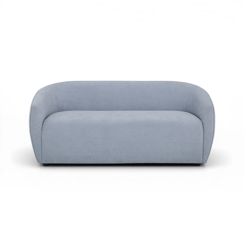 TOV Furniture Jordan stationary loveseat with plush fabric upholstery and modern design, shown in a cozy living room setting.