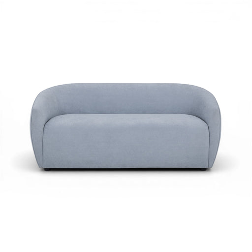TOV Furniture Jordan stationary loveseat with plush fabric upholstery and modern design, shown in a cozy living room setting.