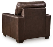 Signature Design by Ashley Santorine living room set with stationary chair and ottoman, featuring plush upholstery and modern design