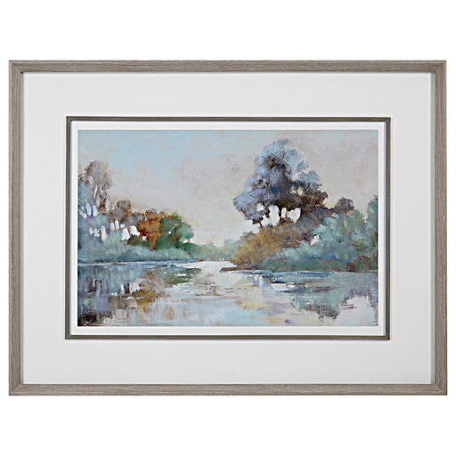 Watercolor framed print titled Morning Lake by Uttermost featuring a serene blue lake scene with a wooden frame.