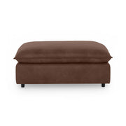 Classic Home Caplan upholstered ottoman with soft fabric and sturdy wooden legs in a modern, versatile design.