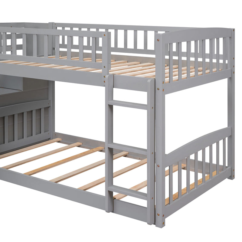 Gray DreamHaus twin over twin bunk bed with stairway, built-in drawers, and slide, ideal for kids' bedroom space.
