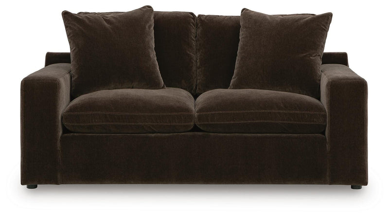 Benchcraft® Maxton Heights stationary loveseat with plush upholstery and modern design, shown in a cozy living room setting.
