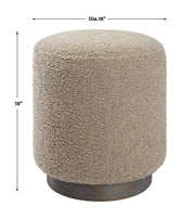 Uttermost Avila accent ottoman with upholstered fabric and wooden legs, versatile piece for living room or bedroom decor.