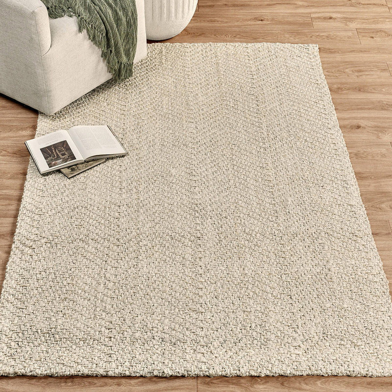 Classic Home herringbone jute rug with natural woven texture, ideal for area rug decor in living rooms or bedrooms.