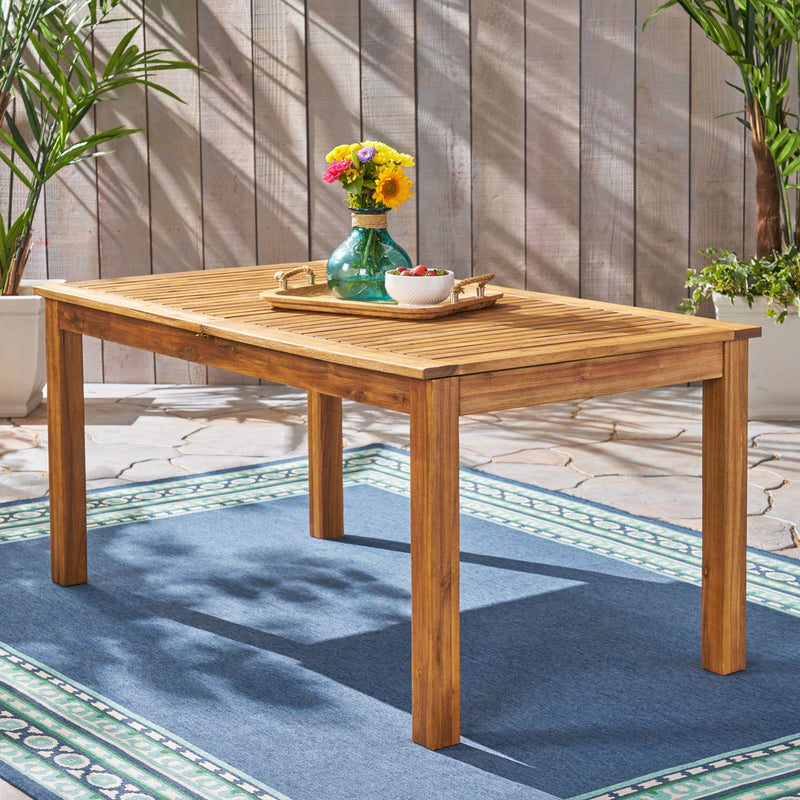 Noble House outdoor expandable dining table with square legs, showcasing a sleek, modern design for outdoor dining spaces.