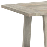 Simpli-Home Whitley dining table with wooden surface and sturdy legs, ideal for modern dining rooms.