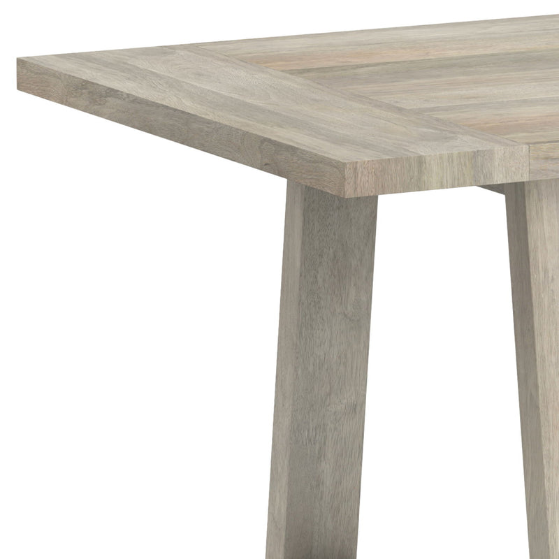Simpli-Home Whitley dining table with wooden surface and sturdy legs, ideal for modern dining rooms.