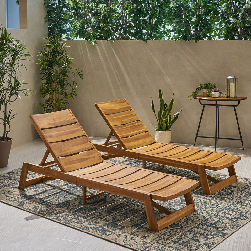 Noble House Maki chaise lounge with plush fabric and modern design, featuring a sleek curved shape and comfortable seating.