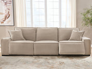 Benchcraft® Carceri reclining sectional sofa with plush cushions and reclining seats, shown in a modern living room setting.