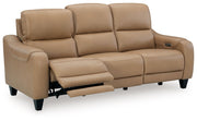 Ashley Mosswell power reclining sofa with adjustable headrest in toffee, showcasing plush upholstery and modern design.