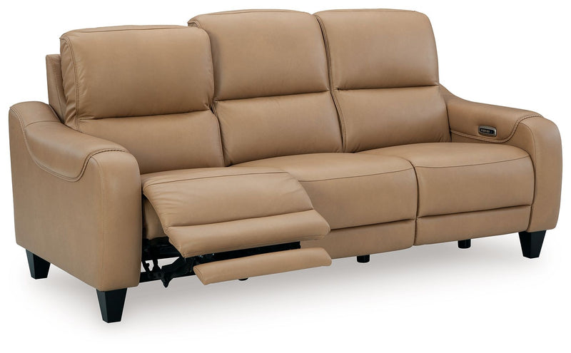Ashley Mosswell power reclining sofa with adjustable headrest in toffee, showcasing plush upholstery and modern design.