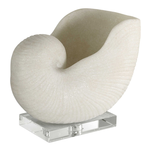 White Nautilus shell sculpture by Uttermost, detailed artistic figurine suitable for home decor or display.