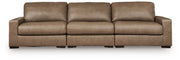 Benchcraft Veronella stationary sectional sofa with plush cushions and modern design, shown in a cozy living room setting.