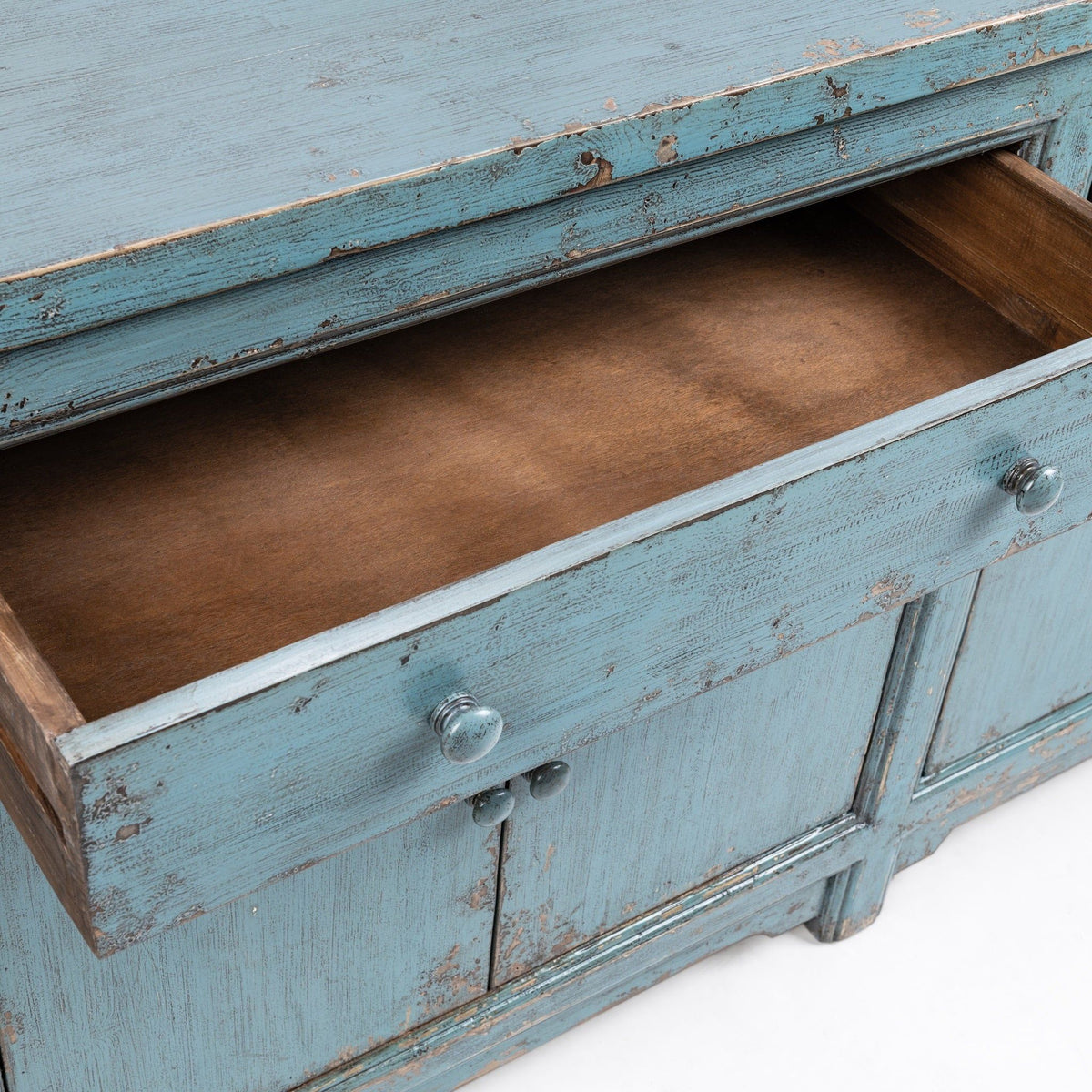 Classic Home Winford 3-drawer, 6-door buffet cabinet with wood finish, featuring spacious storage and modern design.