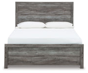 Signature Design by Ashley Bronyan panel bed with a sturdy wooden frame and modern design, shown in a light wood finish.