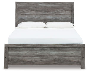 Signature Design by Ashley Bronyan panel bed with a sturdy wooden frame and modern design, shown in a light wood finish.