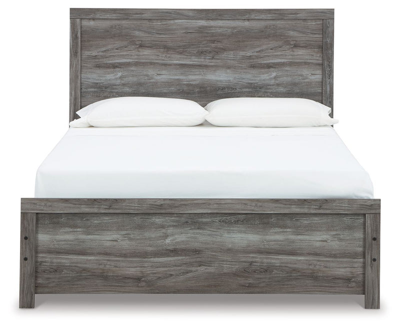 Signature Design by Ashley Bronyan panel bed with a sturdy wooden frame and modern design, shown in a light wood finish.