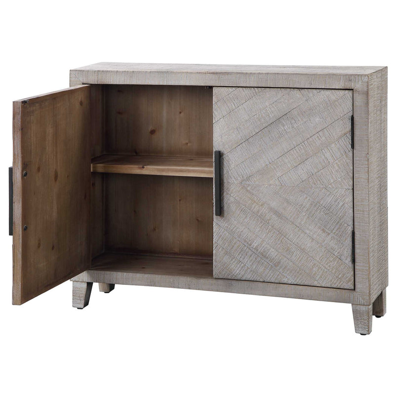White washed Adalind Accent Cabinet by Uttermost with distressed wood finish and sleek design, suitable for living or entryway decor.