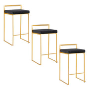 Lumi Source Fuji contemporary glam counter stool set with sleek design and modern black seats and gold accents.