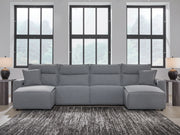 Signature Design by Ashley Modmax II reclining sectional in salt and pepper fabric, showing multiple reclining seats and plush cushions.