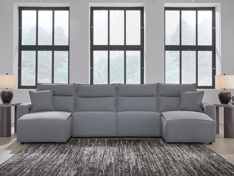 Signature Design by Ashley Modmax II reclining sectional in salt and pepper fabric, showing multiple reclining seats and plush cushions.