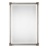 Silver metallic wall mirror by Uttermost with a sleek, round design and reflective mirror surface.