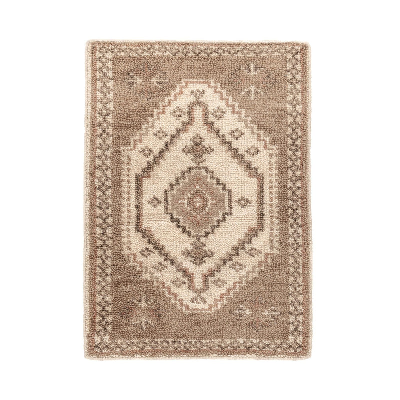 Hand-knotted Luxor Area Rug by Classic Home featuring intricate patterns and warm colors, perfect for enhancing living spaces.