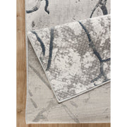 Geometrix - 7'10" X 10'6" Area Rug, Geometric 3D Effect - Ivory / Gray - R&R Furniture Gallery (Fountain Valley, CA)