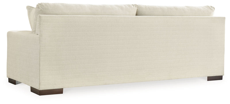 Signature Design by Ashley Maggie living room set with stationary chair and matching ottoman, in a cozy, modern fabric.