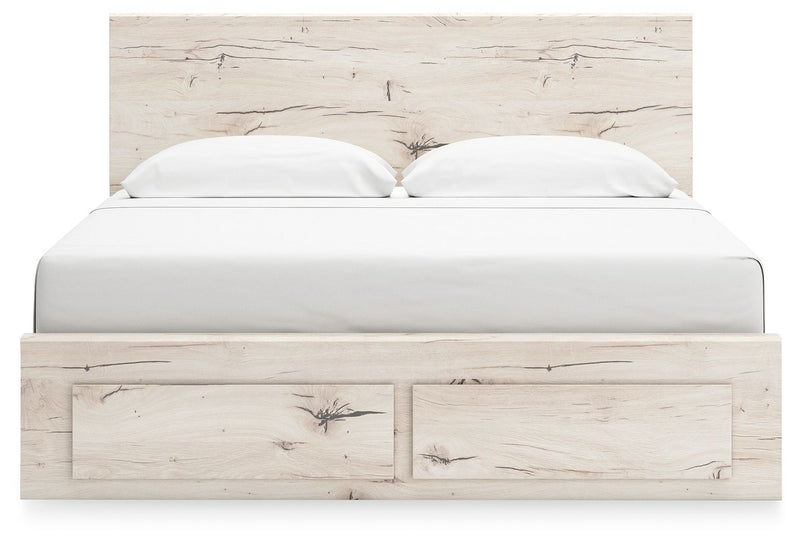 Signature Design by Ashley Lawroy panel bed with built-in storage drawers in a modern bedroom setting.