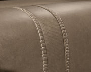 Signature Design by Ashley reclining sectional with plush cushions and chaise lounge, perfect for modern living rooms.