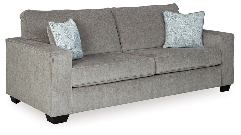 Signature Design by Ashley Altari sleeper sofa with plush fabric, fold-out bed, and modern design in a cozy living room setting.