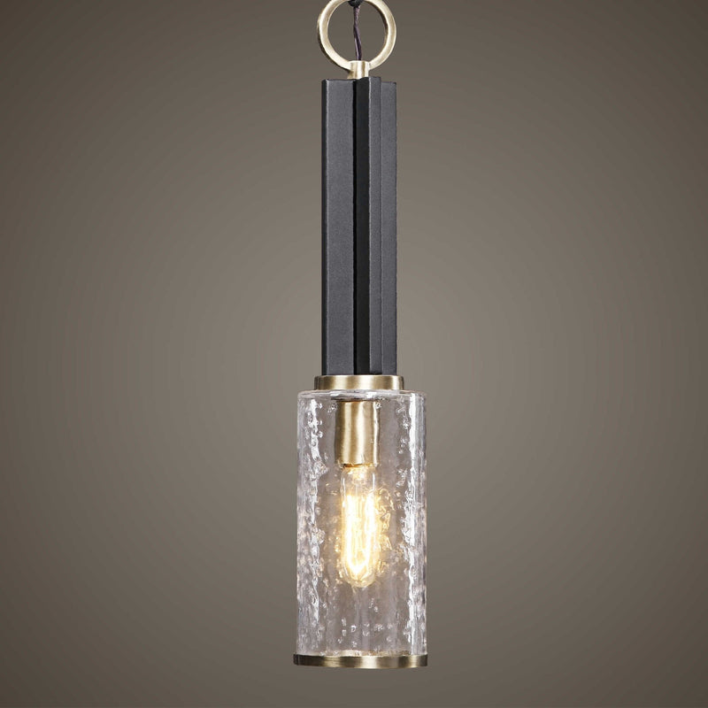 Uttermost Jarsdel black industrial mini pendant light hanging from ceiling with a sleek, modern design.