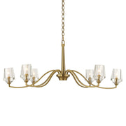 Uttermost Barcelona 6-light brass chandelier with gold finish, featuring elegant curved arms and classic design, hanging from ceiling.