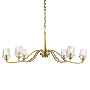 Uttermost Barcelona 6-light brass chandelier with gold finish, featuring elegant curved arms and classic design, hanging from ceiling.