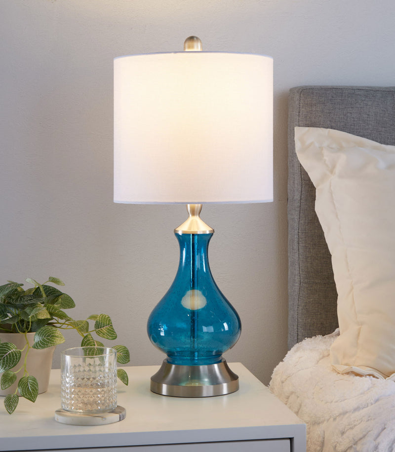 Lumi Source Jasmine contemporary table lamp with clear sapphire blue seeded glass shade, nickel finish, and white interior.