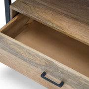 Simpli-Home Riverside TV media stand in natural wood finish, with open shelves and storage compartments for media devices and decor.