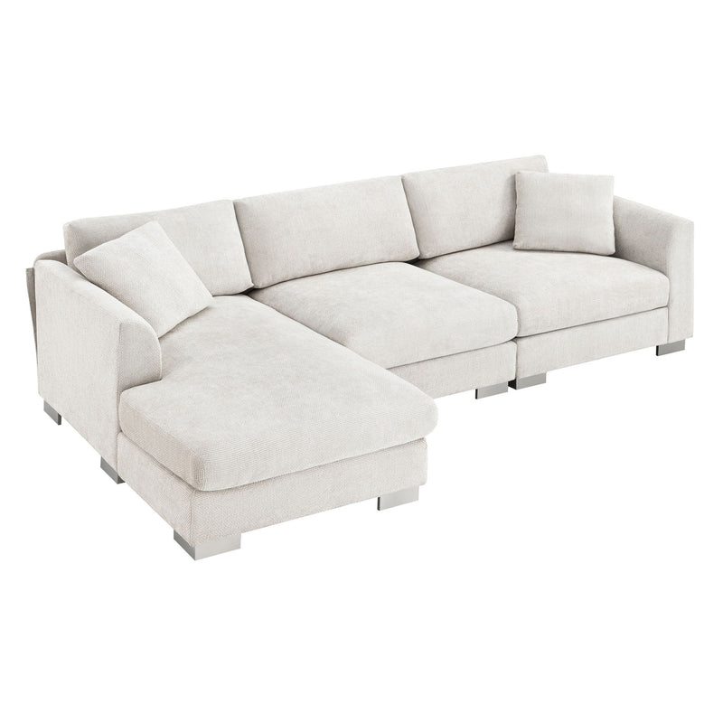 Luxe & Co. modern cloud L-shaped sectional sofa with oversized chaise, four seats, and two free pillows in a stylish living room setting.