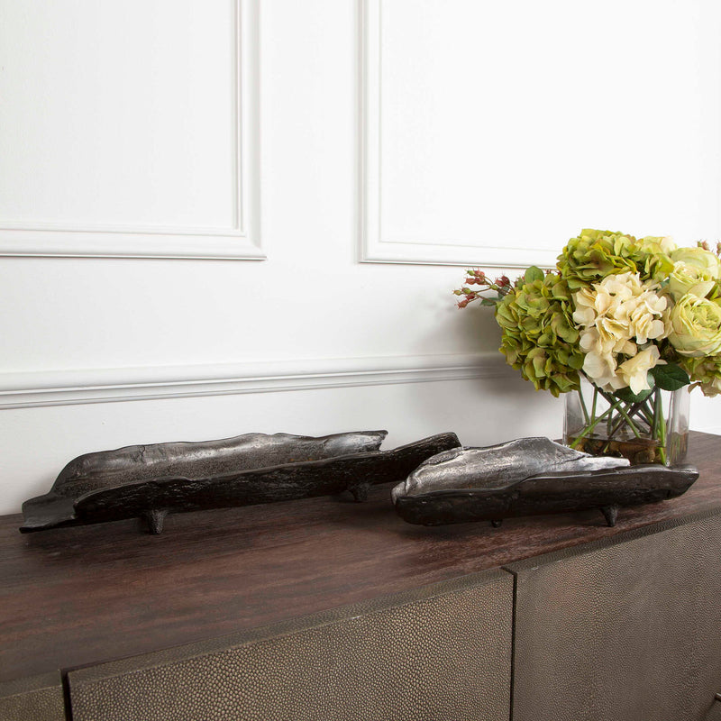 Set of two Uttermost Caryn trays in nickel finish, featuring sleek rectangular design and modern accents.