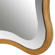 Gold Aneta scalloped accent mirror by Uttermost with a decorative scalloped frame, perfect for stylish wall decor.